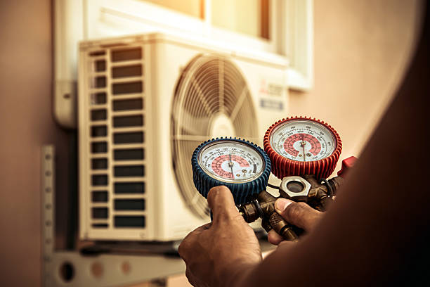 Professional Air Conditioning Service technician working in Montgomeryville, PA